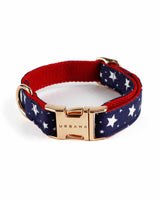 A stylish and adjustable dog collar featuring a gold click buckle and high-quality fabric with soft webbing for comfort and durability.